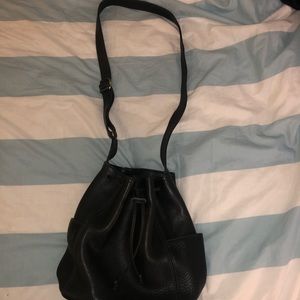 Black leather drawstring purse Coach